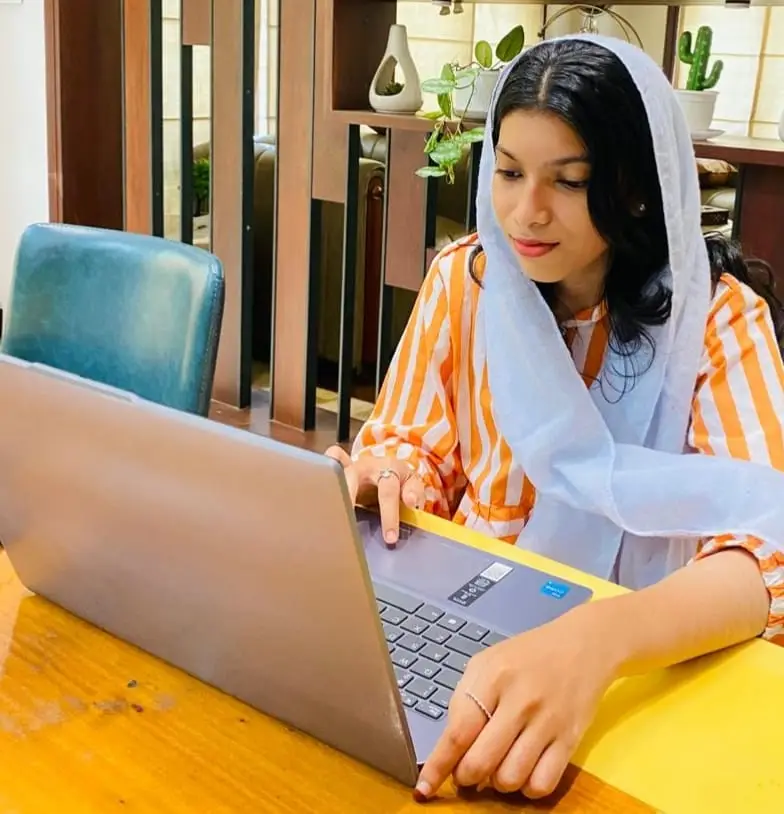 digital marketing analyst working on laptop